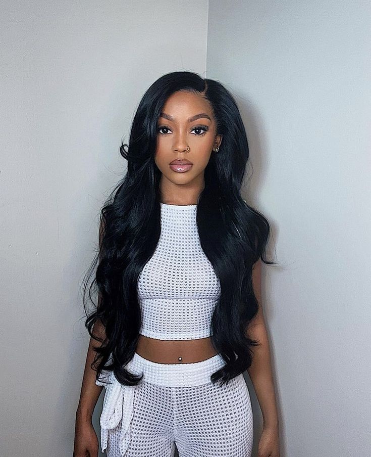 Model wearing a wavy wig style